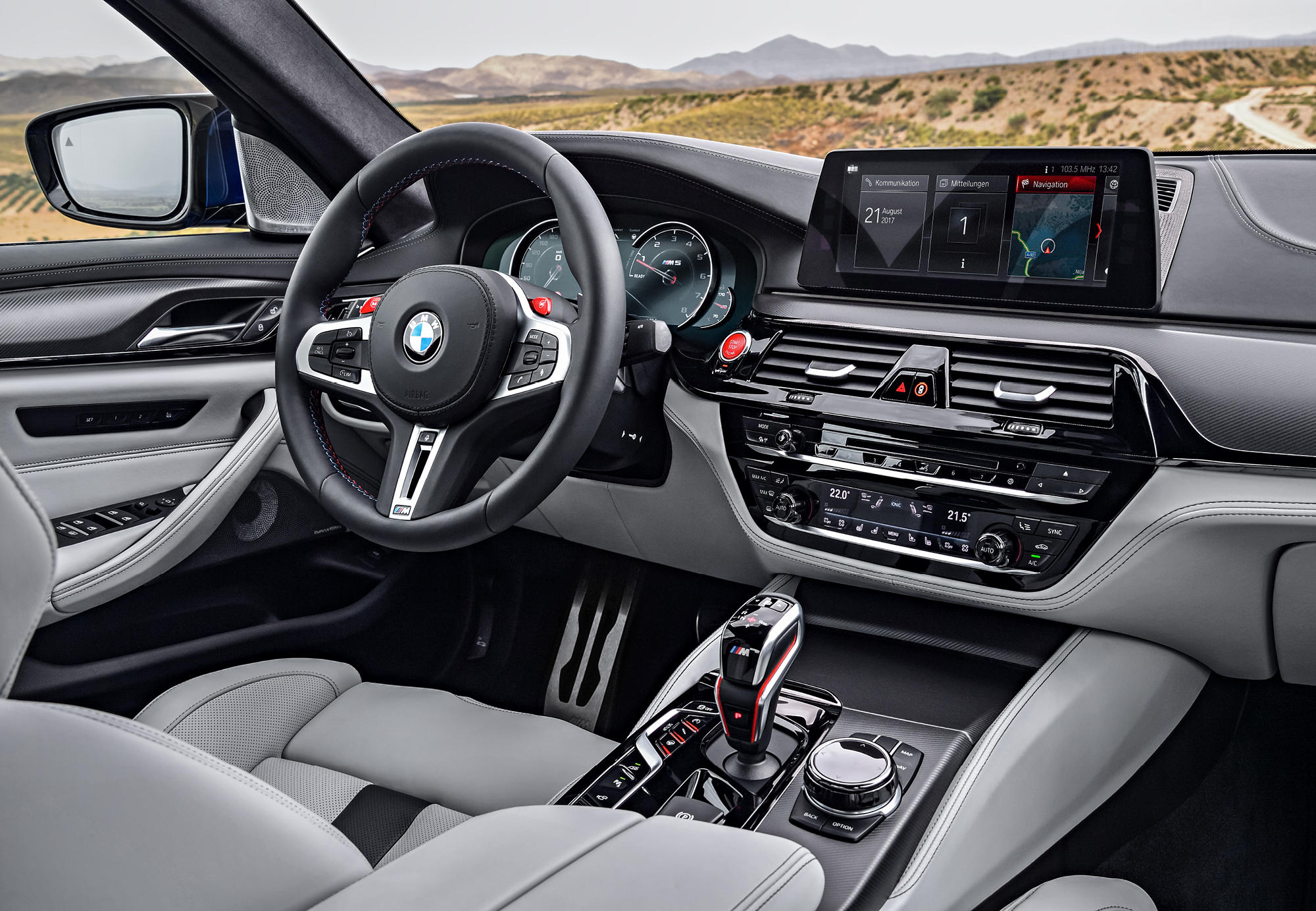 The BMW M5’s luxurious interior belies its furious performance.