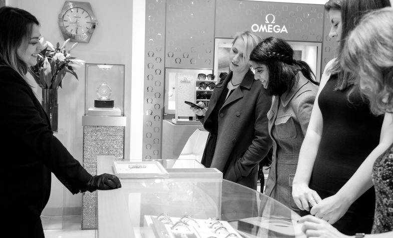 Guests talk to the watch experts at The Royal Exchange's Omega boutique