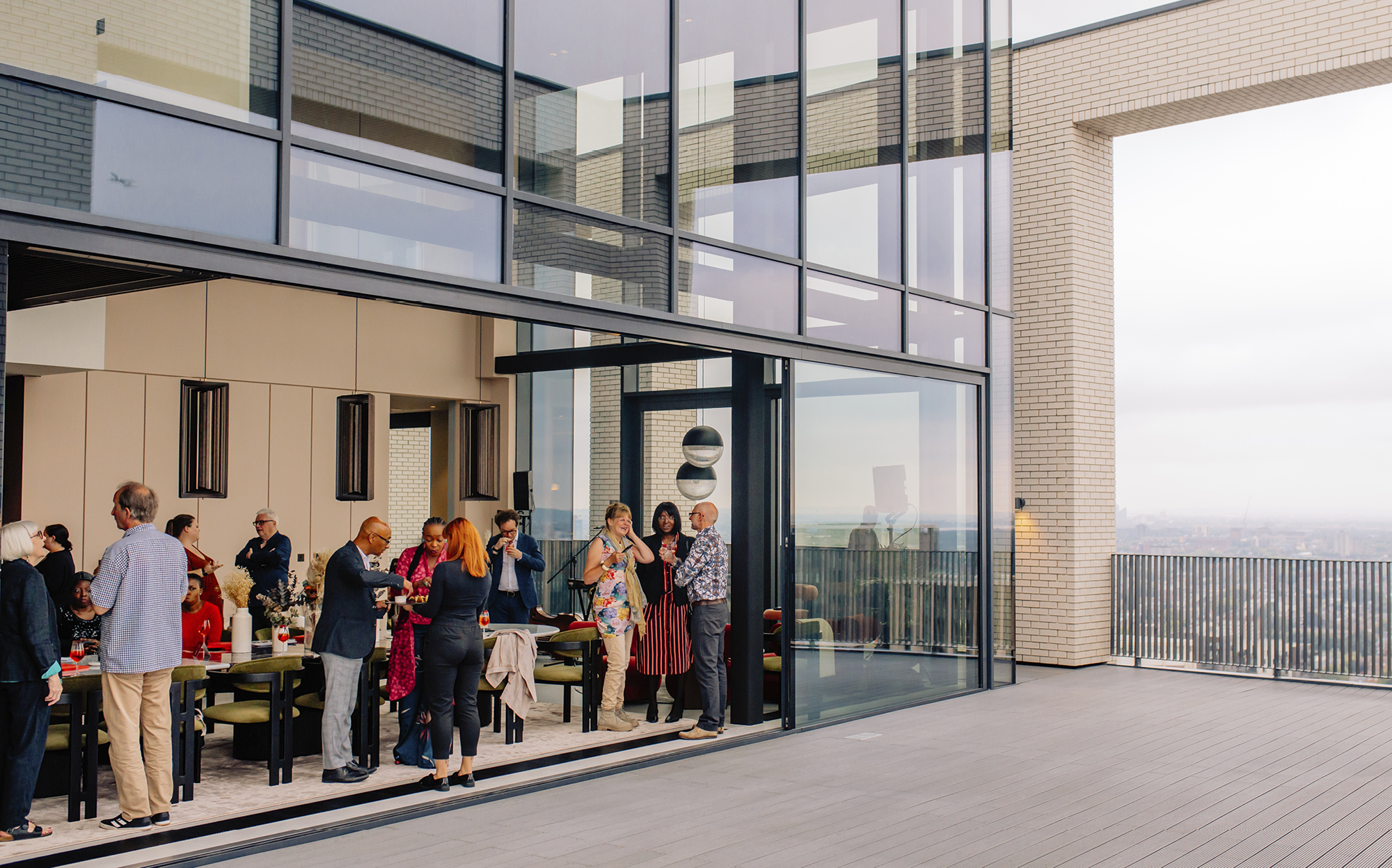 The audience gathers in the brand-new Penthouse at London City Island