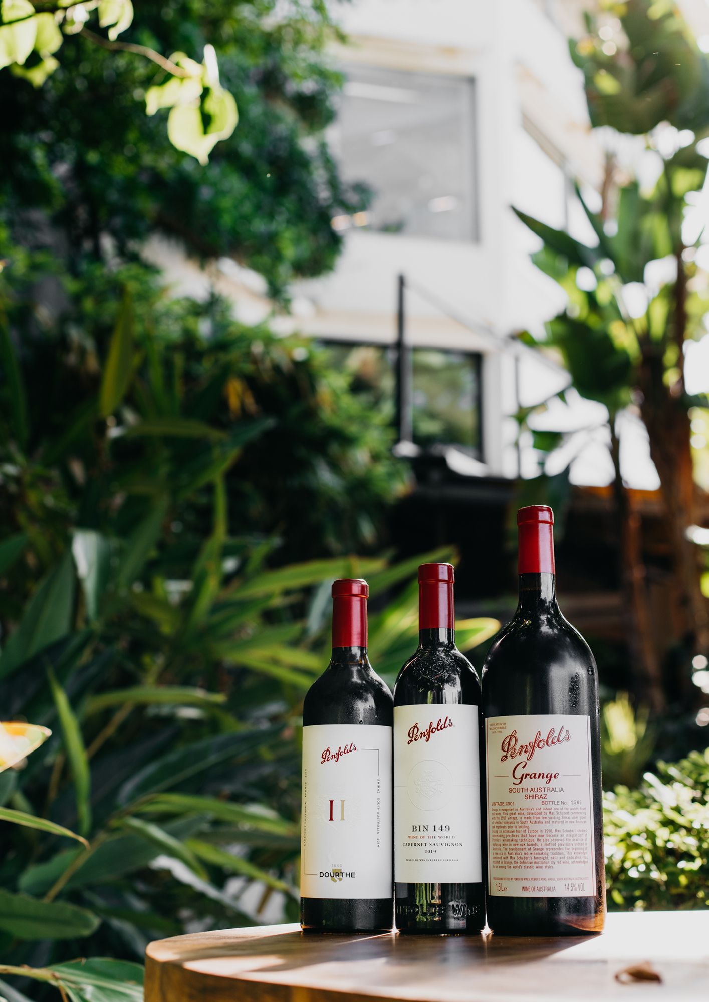 Bottles of Penfolds II, a partnership with Dourthe Bordeaux; Penfolds Bin 149 Cabernet Sauvignon; and Penfolds Grange South Australian Shiraz from the 2001 vintage