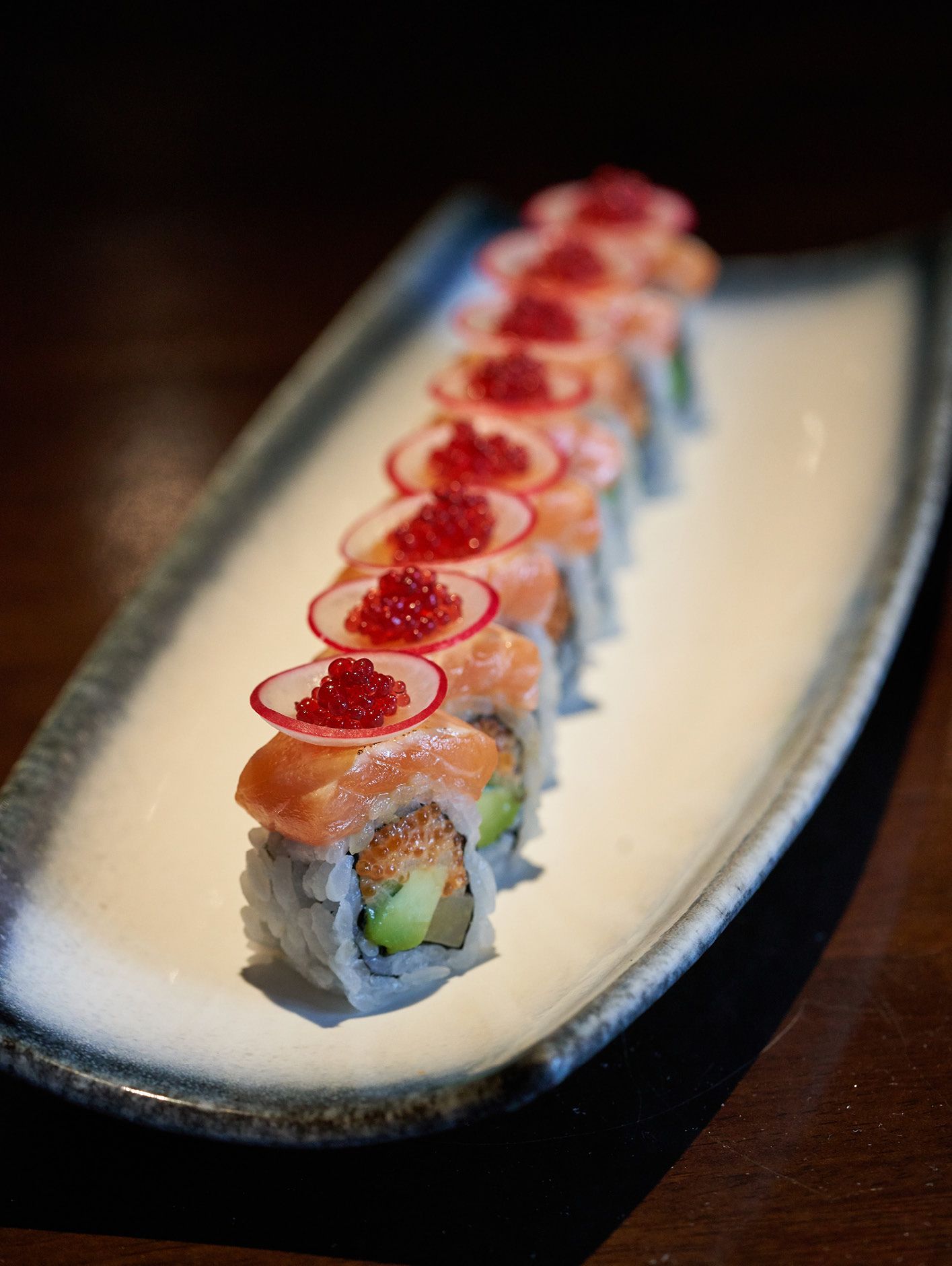 Whitefish sushi topped with red caviar