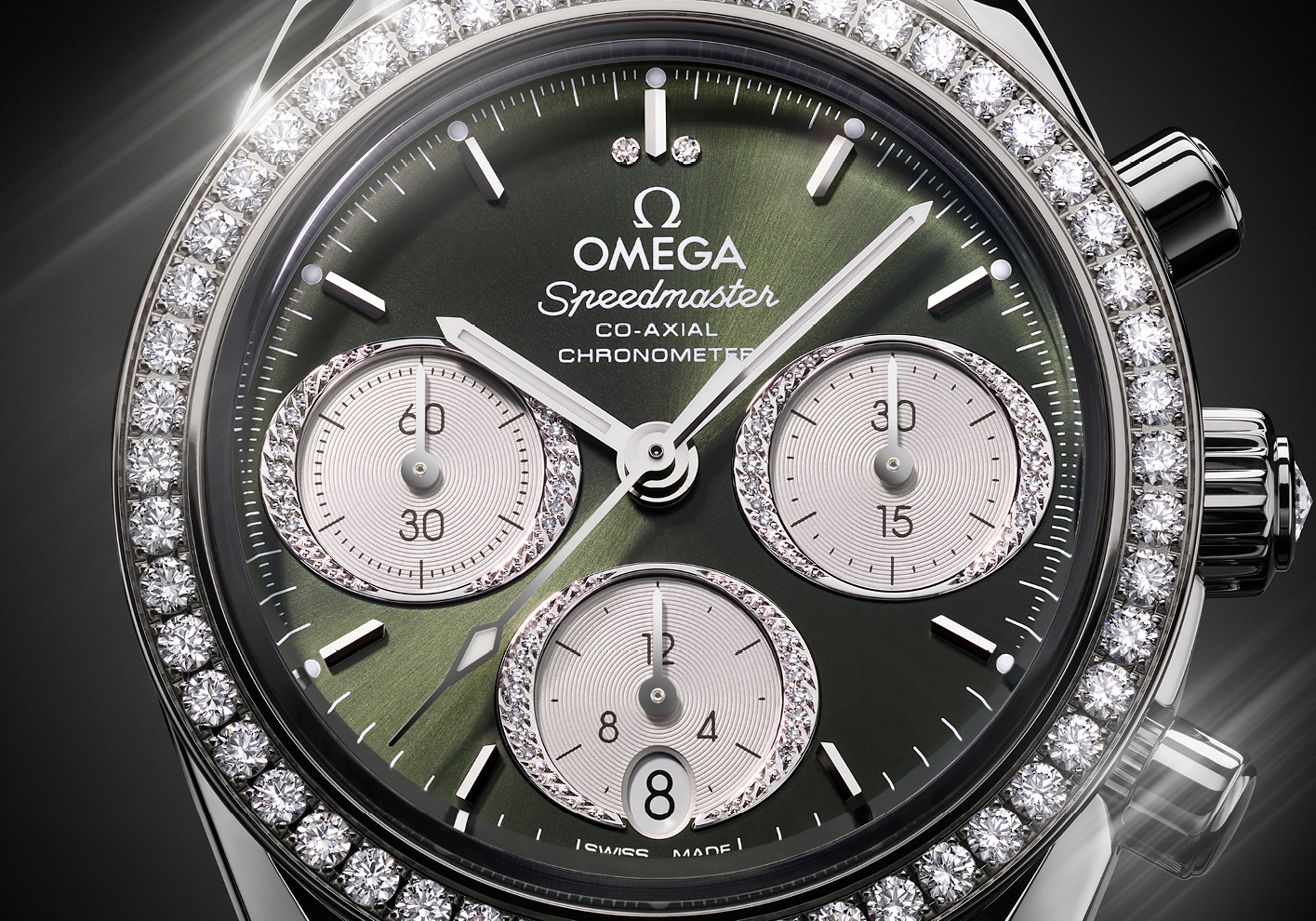 Omega Speedmaster 38 on Stainless Steel with a green PVD dial