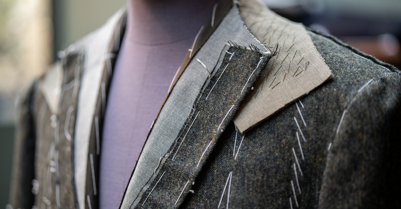 A jacket being tailored