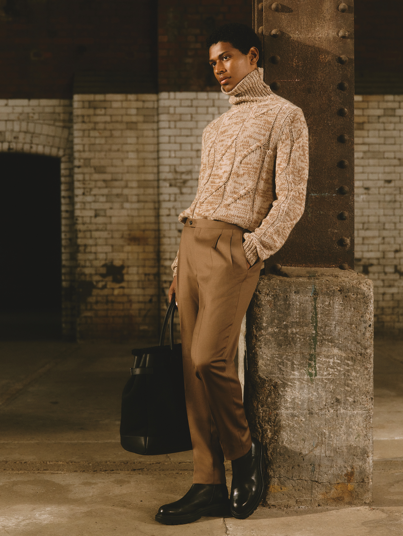 Eco-cashmere turtleneck sweater, £790, gabardine and mohair trousers, £1,250, calfskin Derby shoes, £380 and leather and sheepskin shopper, £2,060. All Corneliani