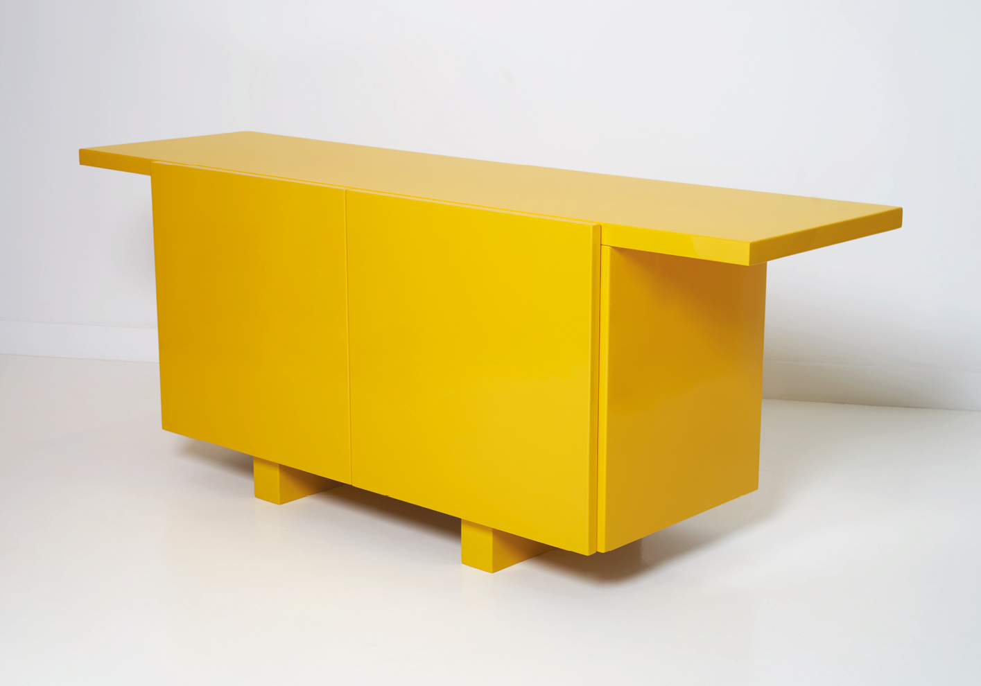 Yellow lacquer sideboard by Emiel Veranneman (1970)