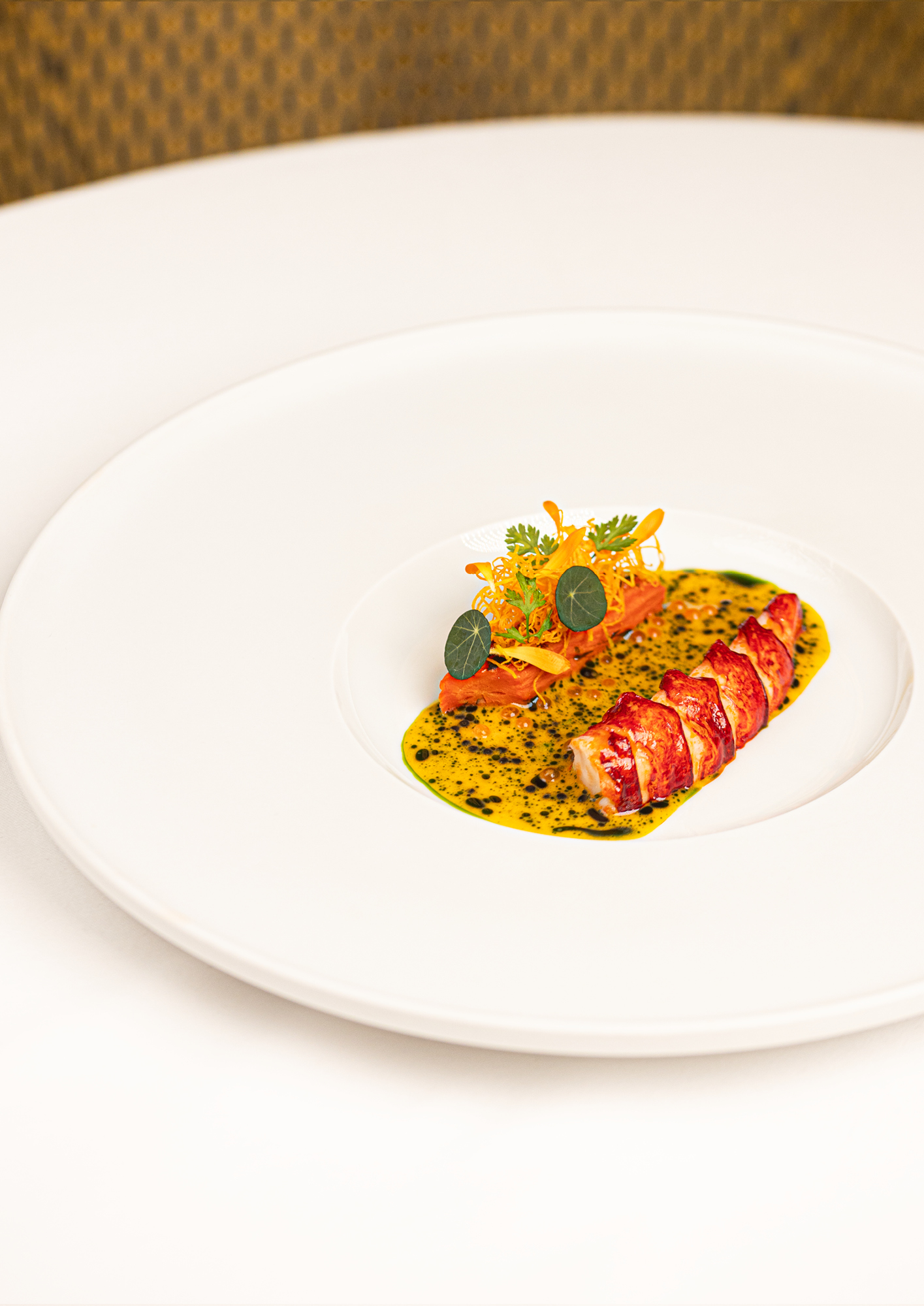 Native lobster with carrot, sea buckthorn and nasturium 